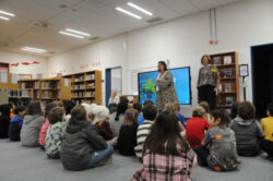 Alicia and Rosemary with schoolchildren